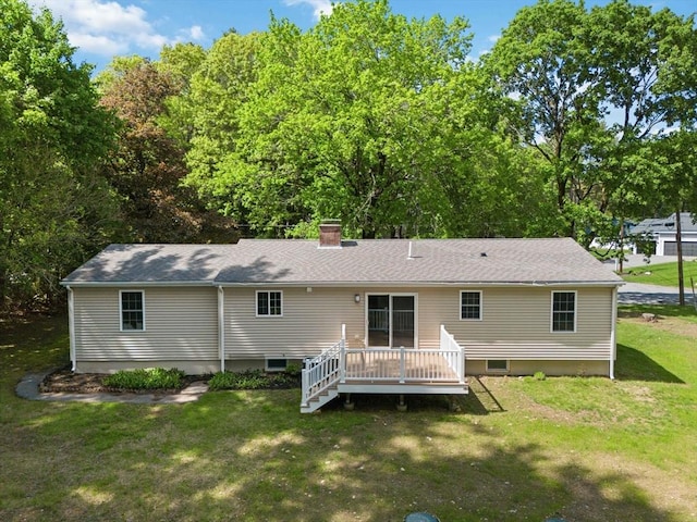 44 Dean Rd, Wayland, MA 01778 - rear view of house featuring a wooden deck, a lawn, and a chimney