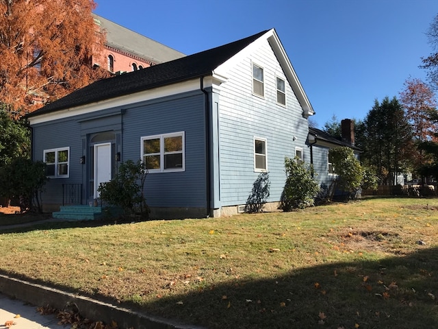 exterior space featuring a lawn