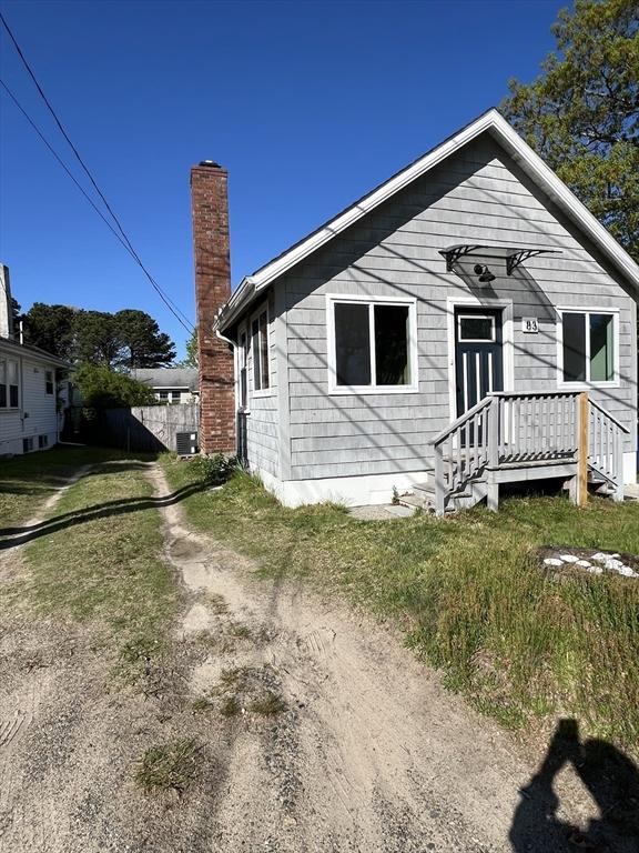 83 Shore Ave, Wareham, MA 02571 - view of front facade with a chimney