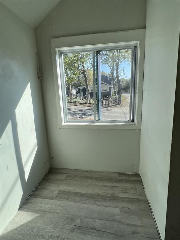 83 Shore Ave, Wareham, MA 02571 - spare room with plenty of natural light, wood finished floors, and vaulted ceiling