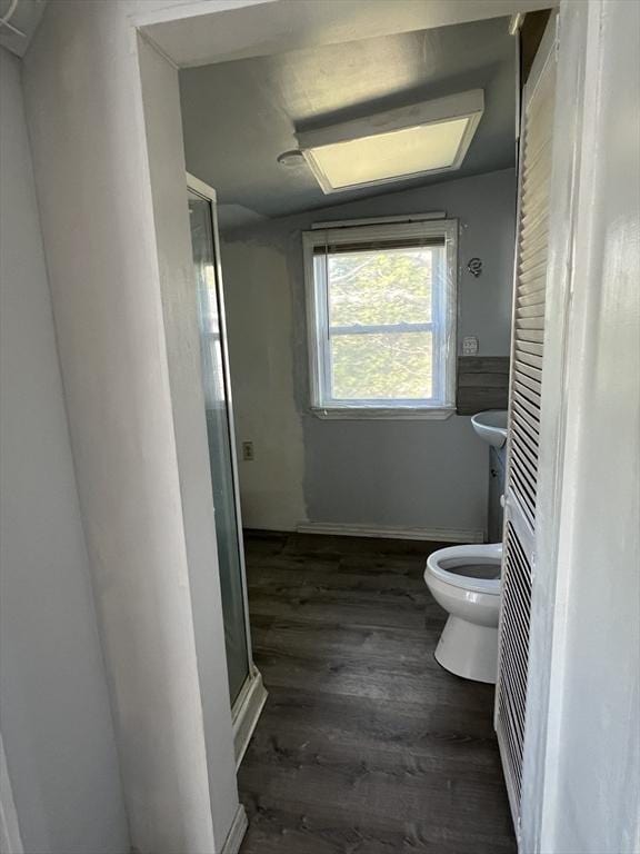 83 Shore Ave, Wareham, MA 02571 - full bathroom featuring toilet, wood finished floors, and a stall shower