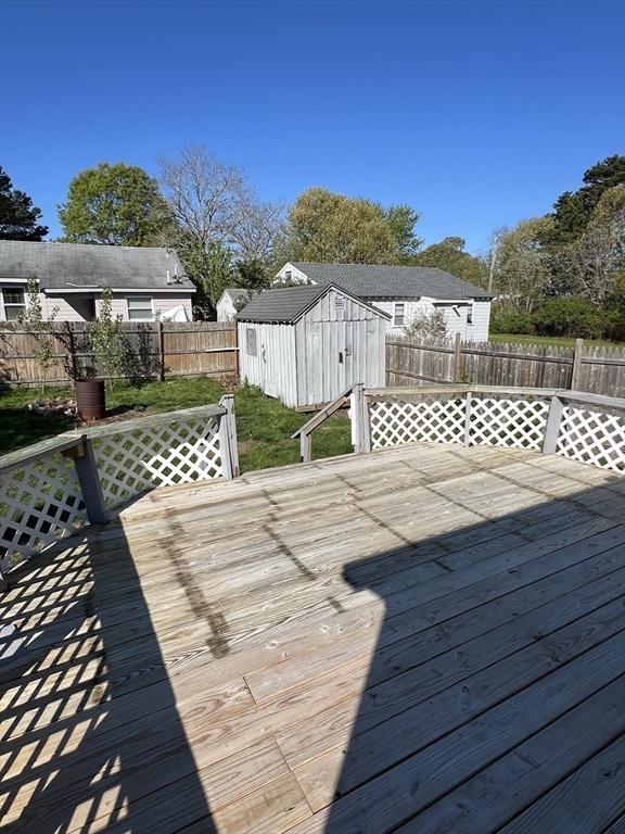 83 Shore Ave, Wareham, MA 02571 - wooden terrace with a fenced backyard