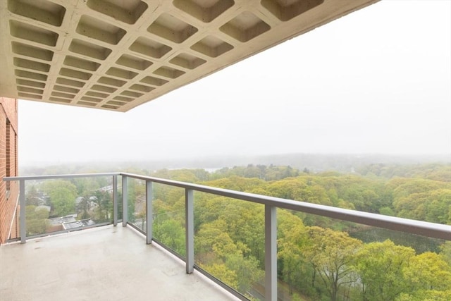 balcony with a wooded view