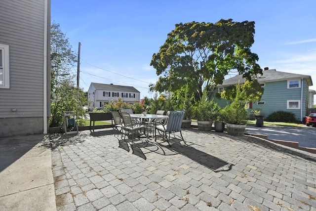 view of patio featuring outdoor dining space