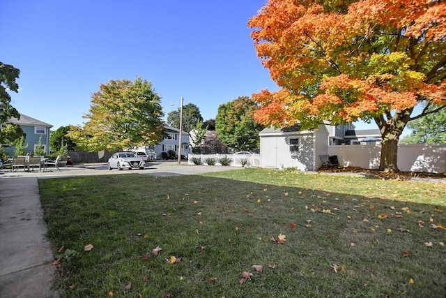 view of yard featuring a patio area and fence