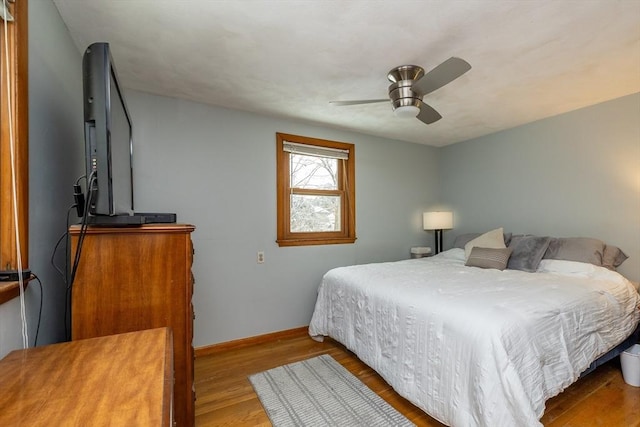 bedroom featuring ceiling fan and light wood-type flooring