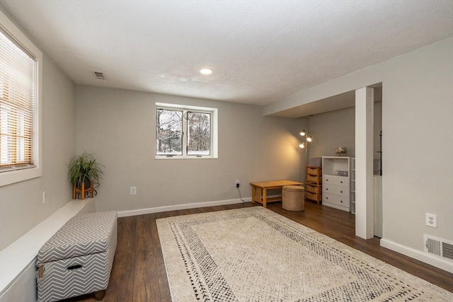 living area featuring dark hardwood / wood-style floors