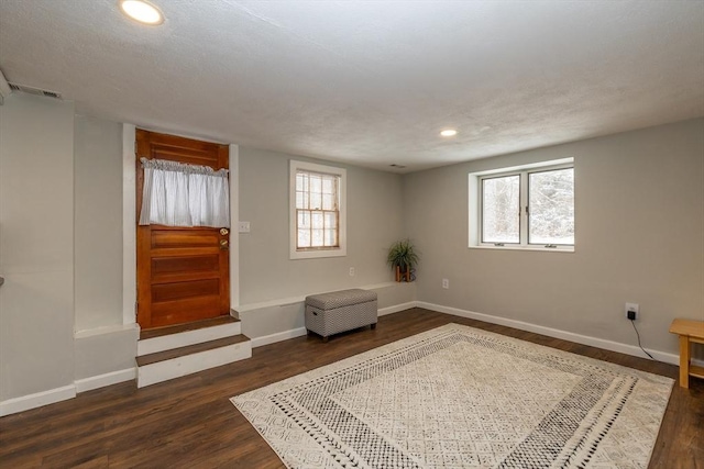 living area featuring dark hardwood / wood-style flooring