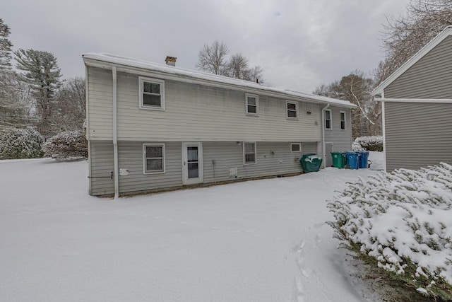 view of snow covered property