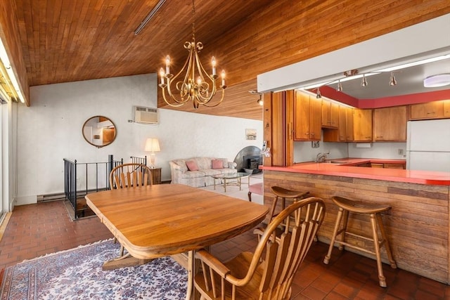 dining area featuring a chandelier, lofted ceiling, brick floor, wooden ceiling, and an AC wall unit