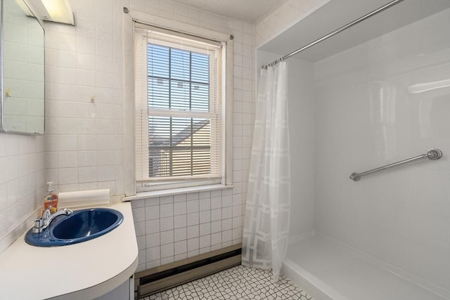 full bathroom featuring a baseboard radiator, tile patterned floors, tile walls, and a shower with curtain