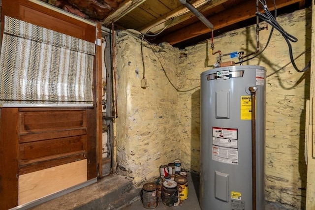 utility room featuring water heater