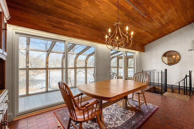 dining room featuring lofted ceiling, brick floor, wooden ceiling, a baseboard radiator, and a sunroom