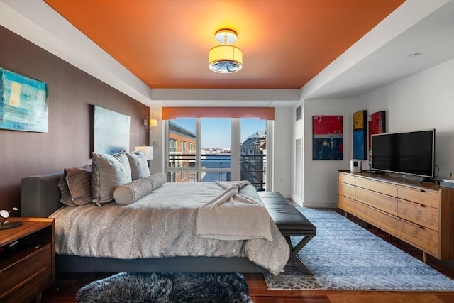 bedroom featuring dark wood-type flooring