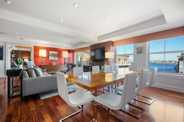 dining room with hardwood / wood-style flooring