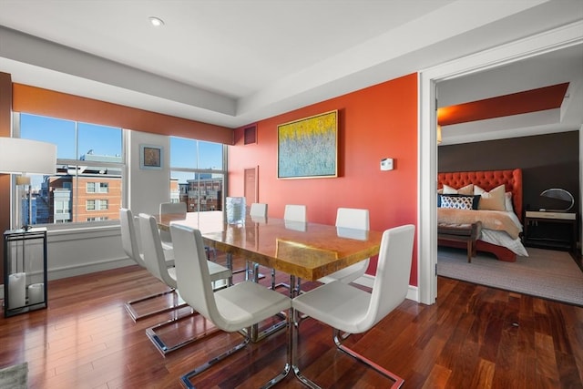 dining area with hardwood / wood-style floors