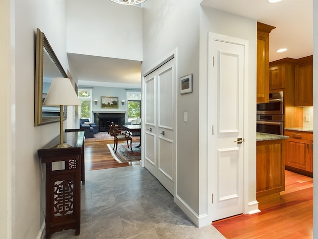 corridor with dark wood-type flooring