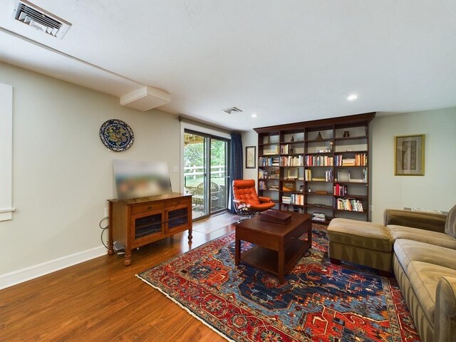 living room with wood-type flooring