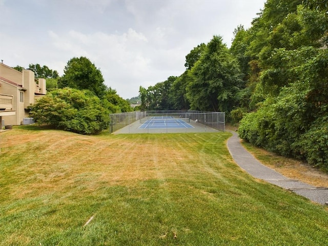 view of yard with tennis court