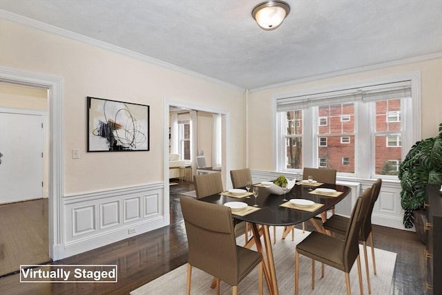 132 Sewall Ave Unit B, Brookline, MA 02446 - dining space featuring crown molding, wainscoting, and dark wood-type flooring