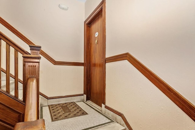 132 Sewall Ave Unit B, Brookline, MA 02446 - staircase with baseboards