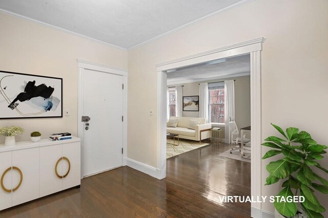 132 Sewall Ave Unit B, Brookline, MA 02446 - entrance foyer with ornamental molding and wood finished floors