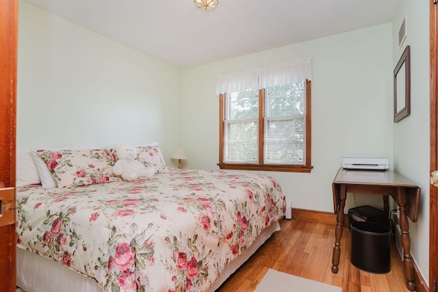 bedroom featuring light hardwood / wood-style floors