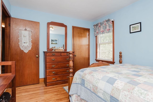 bedroom featuring light wood-type flooring