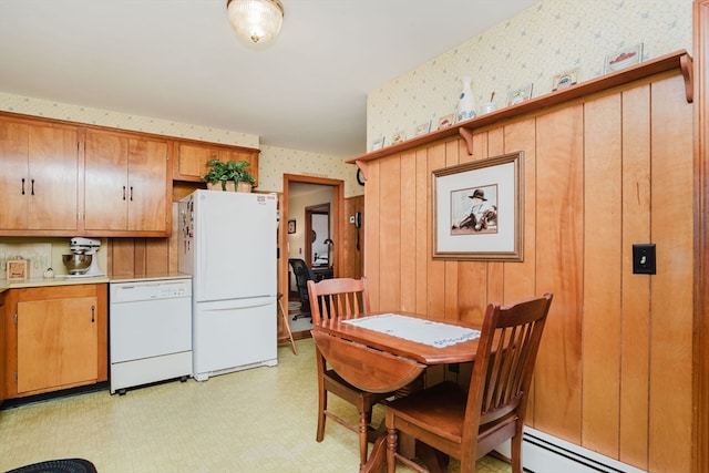 dining area with a baseboard heating unit