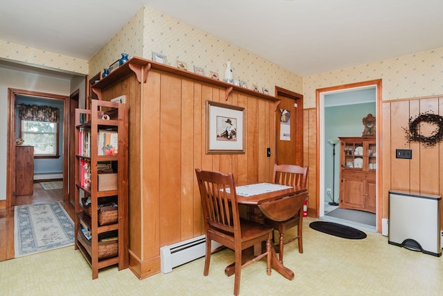 dining area featuring a baseboard radiator