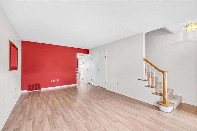 empty room with light wood-type flooring