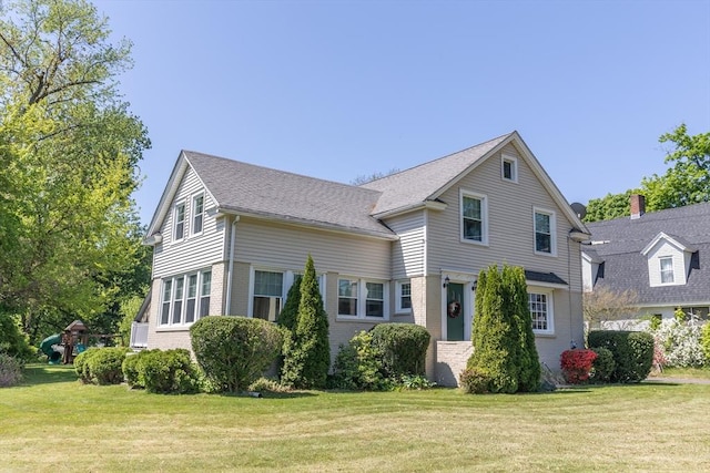 103 Maple Rd, Longmeadow, MA 01106 - traditional home with brick siding and a front yard