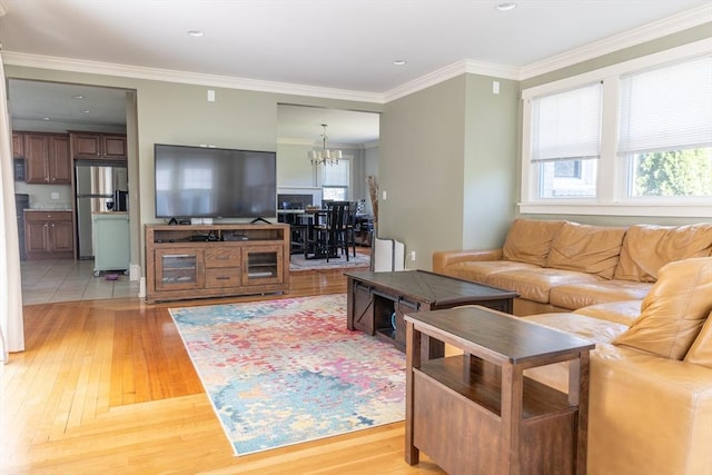 103 Maple Rd, Longmeadow, MA 01106 - living area with a chandelier, light wood-style flooring, crown molding, and recessed lighting