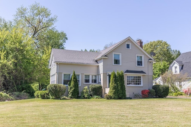 103 Maple Rd, Longmeadow, MA 01106 - traditional-style house featuring a chimney and a front lawn
