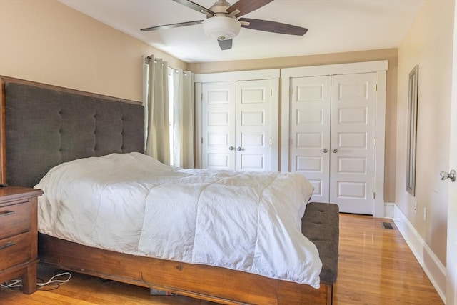 103 Maple Rd, Longmeadow, MA 01106 - bedroom featuring light wood-style flooring, two closets, ceiling fan, and baseboards