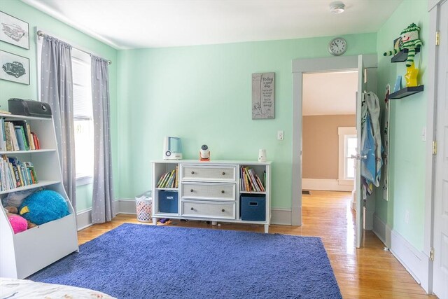 103 Maple Rd, Longmeadow, MA 01106 - bedroom featuring multiple windows, wood finished floors, and baseboards