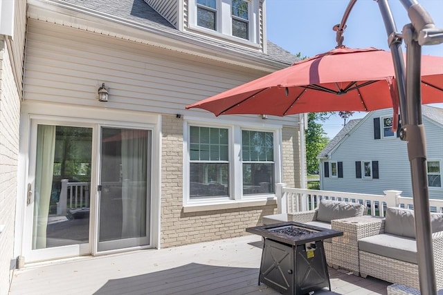 103 Maple Rd, Longmeadow, MA 01106 - wooden deck featuring an outdoor fire pit