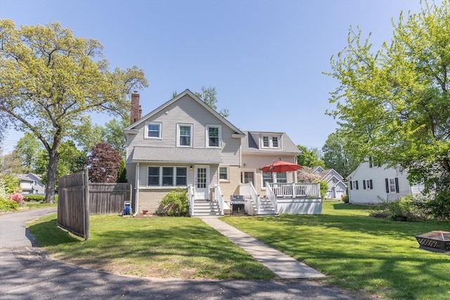 103 Maple Rd, Longmeadow, MA 01106 - traditional-style house with a chimney and a deck
