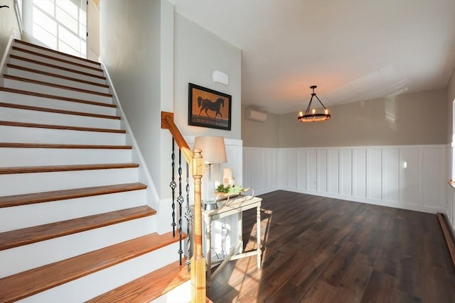 stairs with wood-type flooring