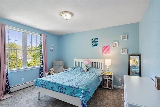 bedroom with baseboard heating, carpet floors, and baseboards