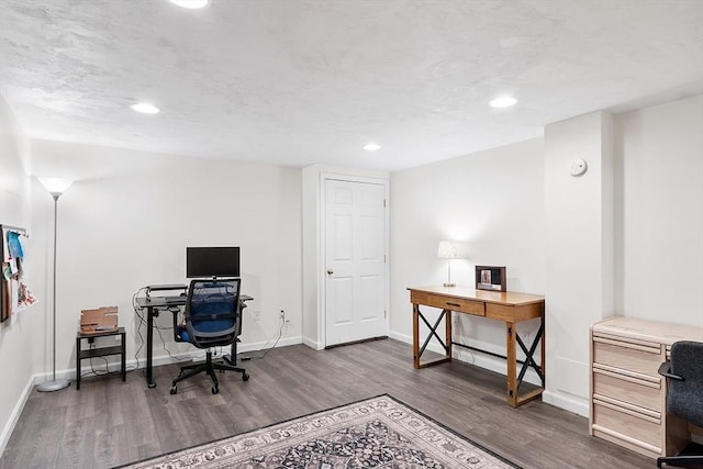 office space with wood finished floors, baseboards, and recessed lighting