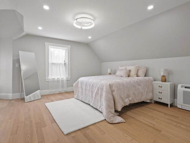 34 Rockland St, Melrose, MA 02176 - bedroom with vaulted ceiling, light wood-style flooring, and recessed lighting