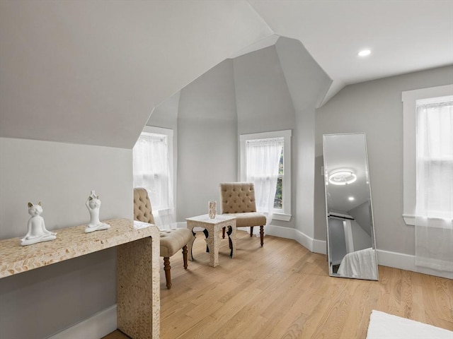 34 Rockland St, Melrose, MA 02176 - sitting room with vaulted ceiling, healthy amount of natural light, and light wood finished floors