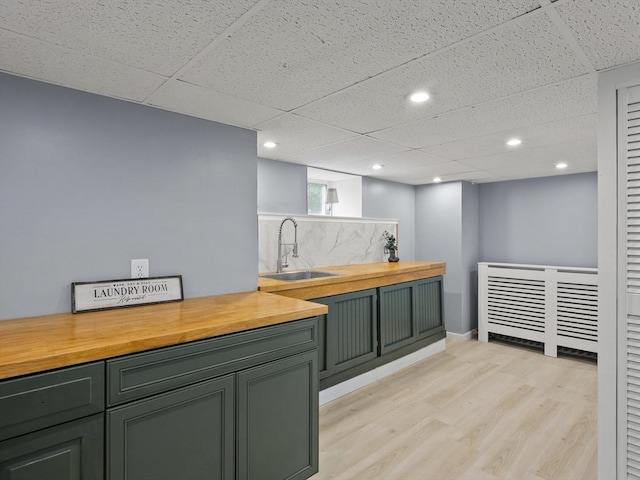 34 Rockland St, Melrose, MA 02176 - bar area with light wood finished floors, recessed lighting, and a paneled ceiling