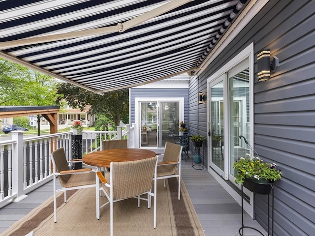 34 Rockland St, Melrose, MA 02176 - wooden terrace with outdoor dining area