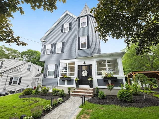 34 Rockland St, Melrose, MA 02176 - view of front of house featuring a front lawn