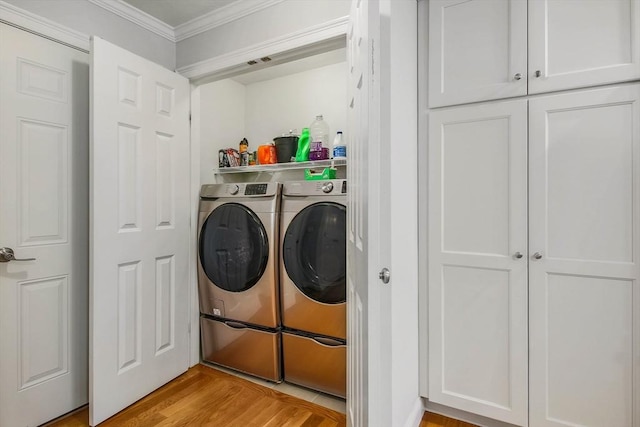 11 Bigelow Dr Unit 11, Berlin, MA 01503 - laundry room featuring separate washer and dryer, ornamental molding, and light wood finished floors
