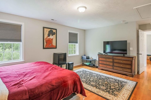 11 Bigelow Dr Unit 11, Berlin, MA 01503 - bedroom with attic access and wood finished floors