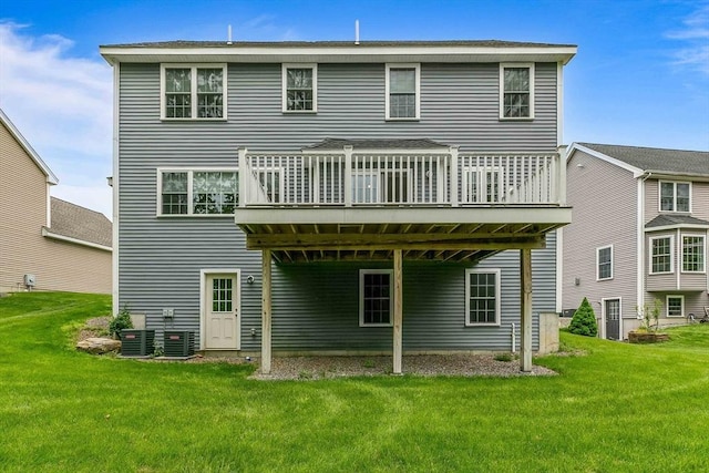 11 Bigelow Dr Unit 11, Berlin, MA 01503 - rear view of house featuring a yard, a wooden deck, and cooling unit