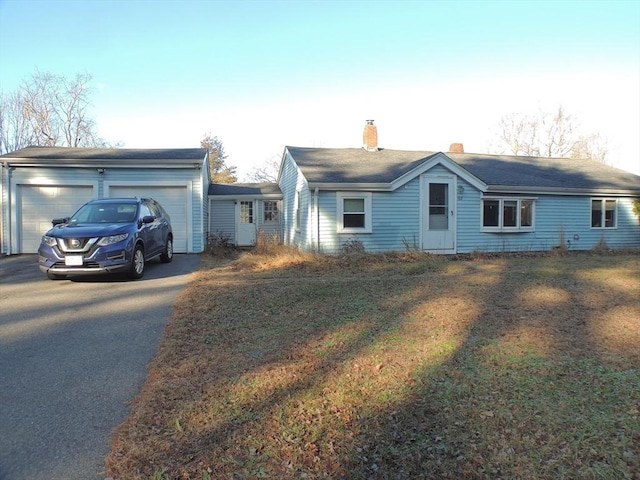 ranch-style home with a garage